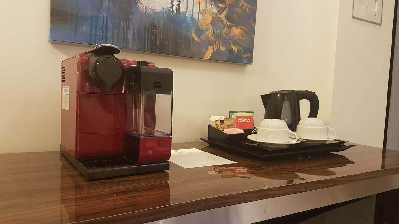 Tio Sea Resort อัลคอร์ ภายนอก รูปภาพ A Nespresso coffee machine in a hotel room